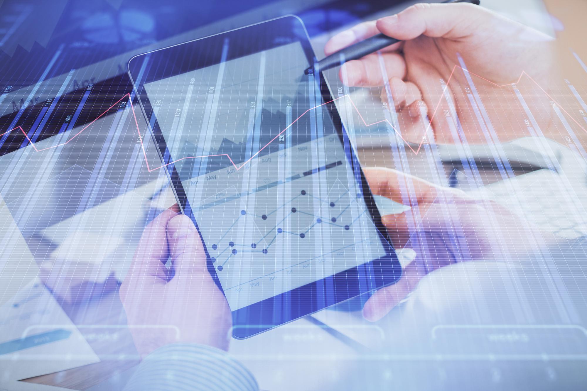 Closeup of analytics on transparent tablet
